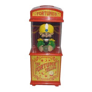 The Fortune Teller orange talking coin bank still 8.5" tall SUMMIT 2010
